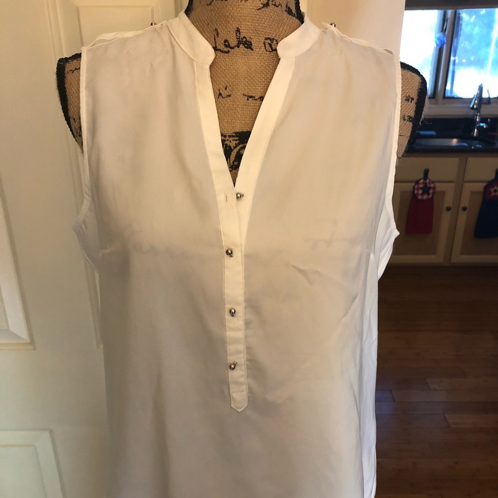 White sleeveless shirt with silver details!